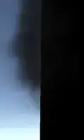The same particle system rendered with standard alpha blending